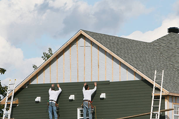 Professional Siding technician working in Pineville, NC